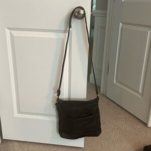The Sak crossbody bag. Dark brown leather. Gently used.